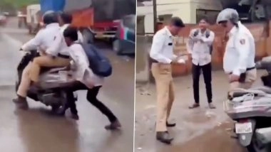 Mumbai: Fined Over No Helmet, Biker Confronts Traffic Cops for Riding Scooter With Broken Number Plate; Video Goes Viral Mumbai: Fined Over No Helmet, Biker Confronts Traffic Cops for Riding Scooter With Broken Number Plate; Video Goes Viral